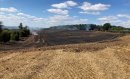 Firefighters tackle 15-acre fire in field Image